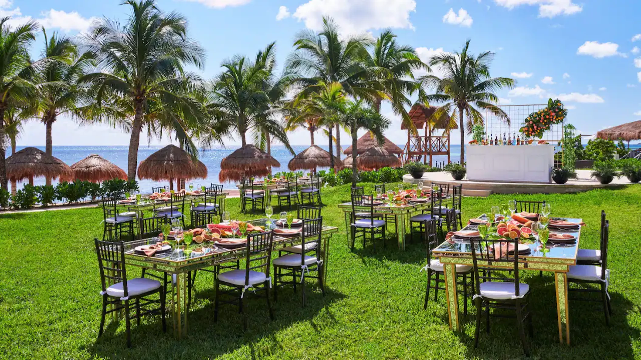 Dinner reception in central garden wedding venue at Hyatt Ziva Riviera Cancun