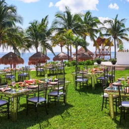 Dinner reception in central garden wedding venue at Hyatt Ziva Riviera Cancun