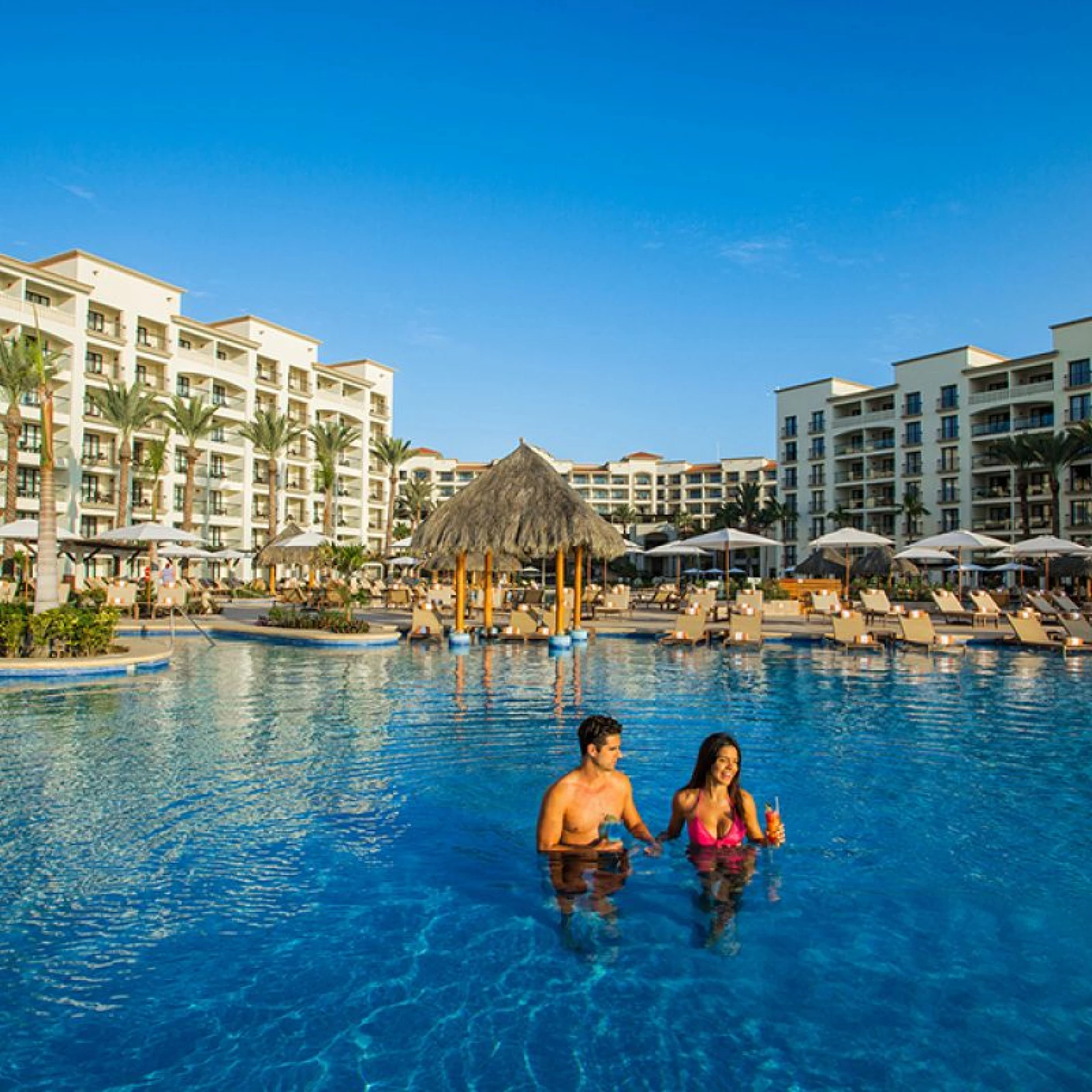 Couple at the Hyatt Ziva Los Cabos Main Pool