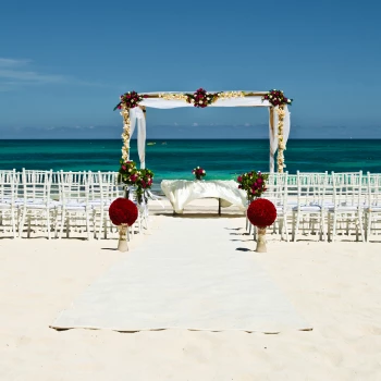 Iberostar Grand Paraiso beach wedding venue with chairs