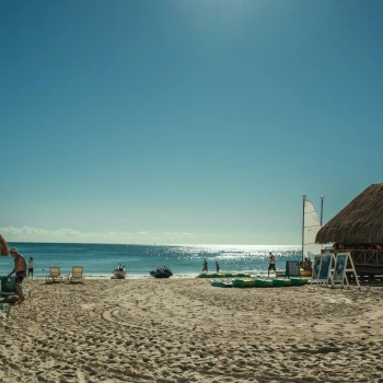 Iberostar Selection Paraiso Maya Suites beach with palapa