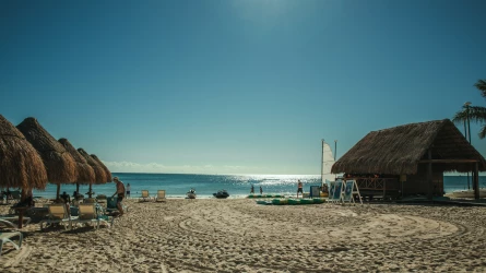 Iberostar Selection Paraiso Maya Suites beach with palapa