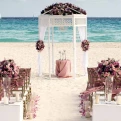 Iberostar Quetzal beach wedding venue with chairs and altar