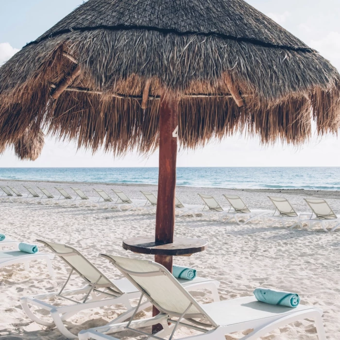 Iberostar Selection Cancun palapa and lounge chair on beach