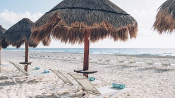 Iberostar Selection Cancun palapa and lounge chair on beach
