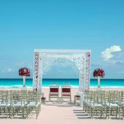 Ceremony decor in the beach venue at Coral Level at Iberostar Selection Cancun