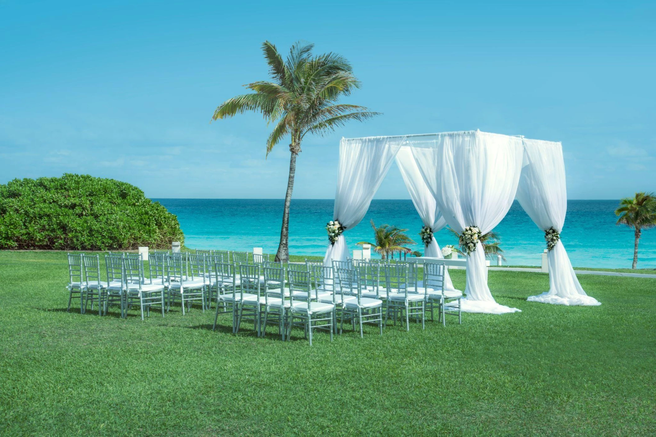 Symbolic ceremony in the miramar garden at Coral Level at Iberostar Selection Cancun