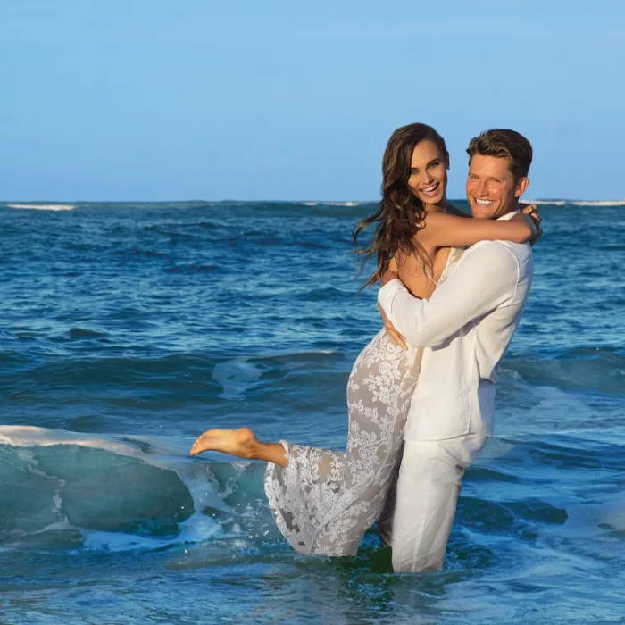 Wedding couple on the ocean at Dreams Onyx Resort & Spa