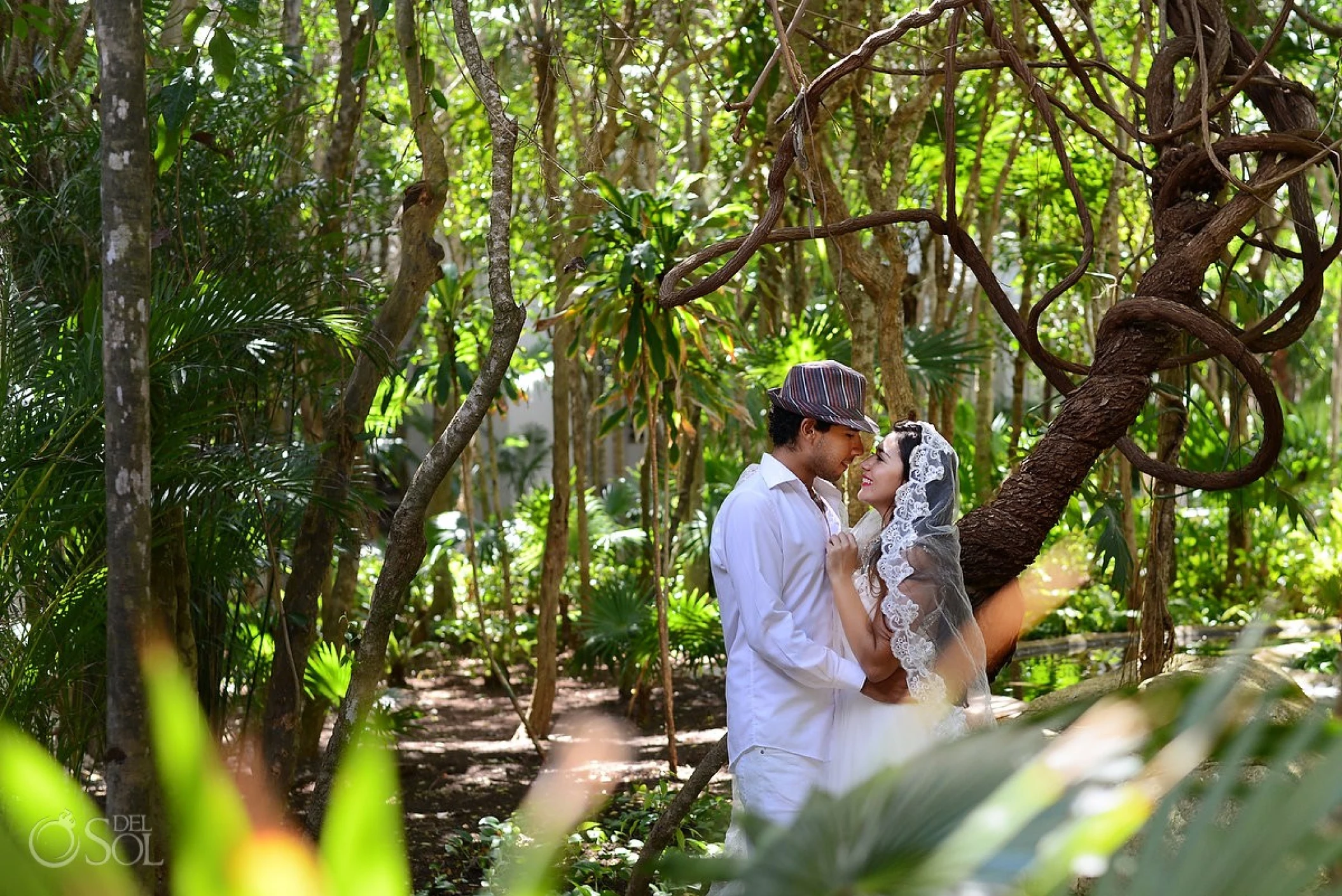 Couple at the garden wedding venue at Kore Tulum Retreat and Spa
