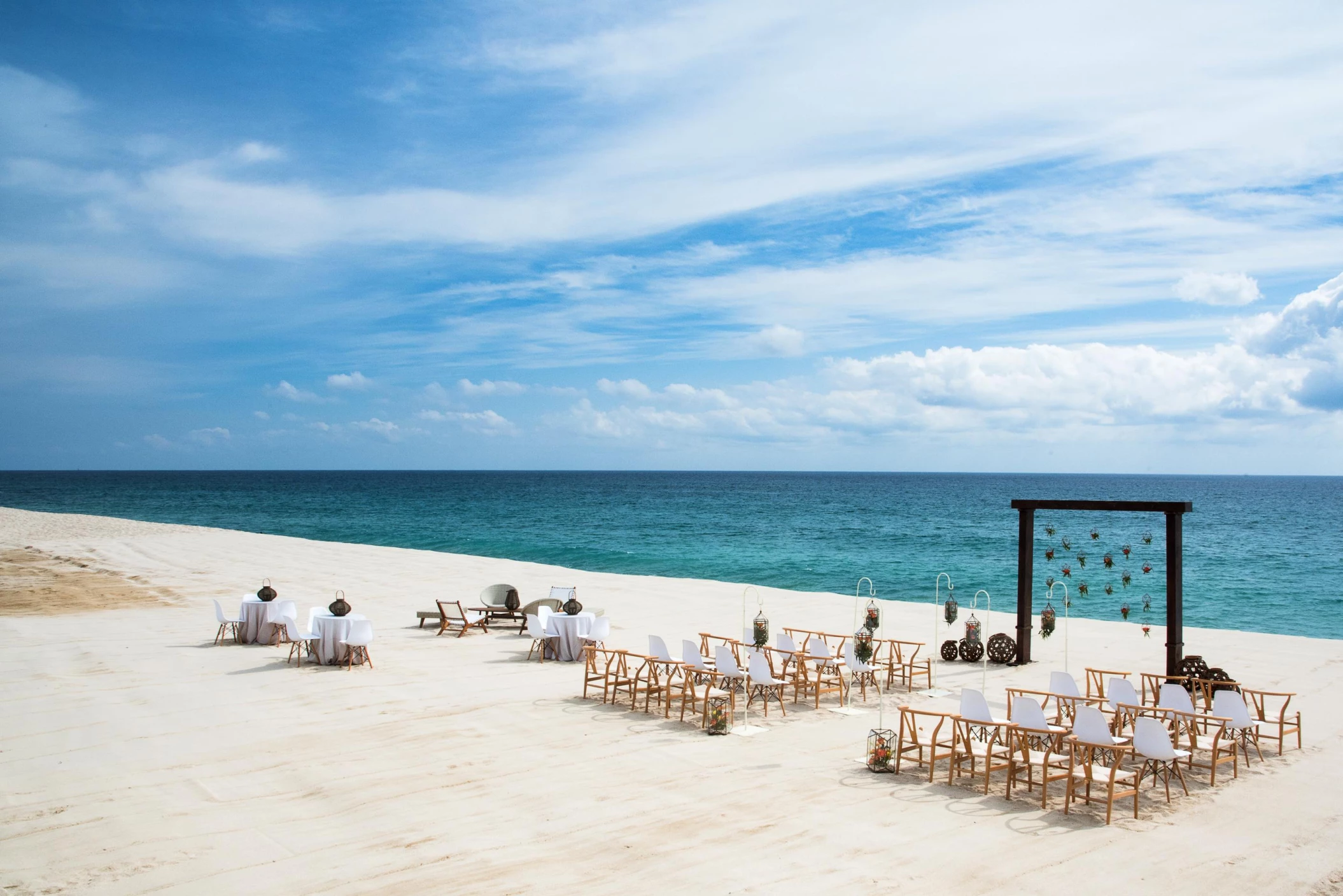 Ceremony decor on the blanc beach wedding venue at Le Blanc Spa Resort Los Cabos