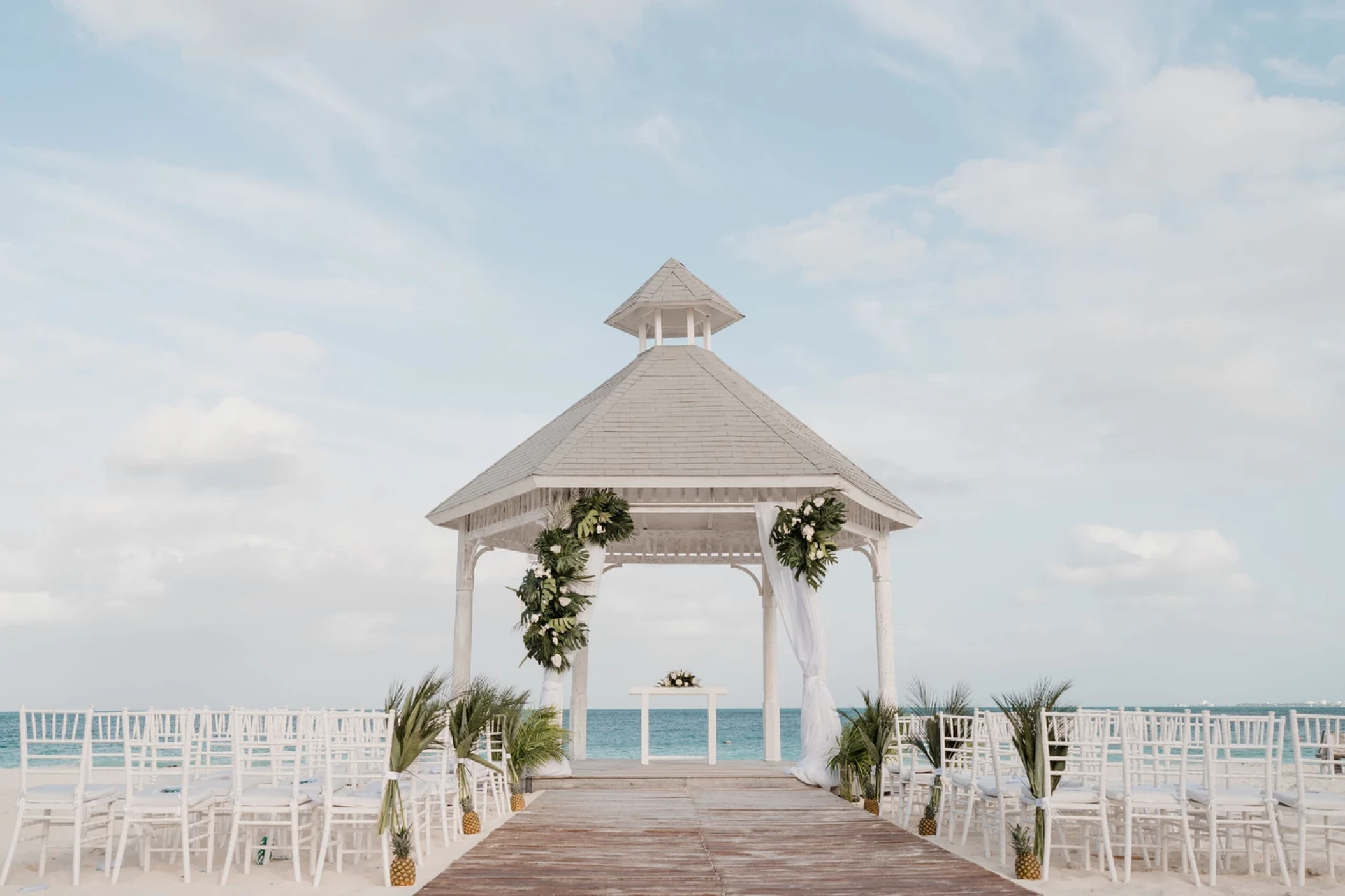 Wedding ceremony in Beach gazebo at Majestic Elegance Costa Mujeres