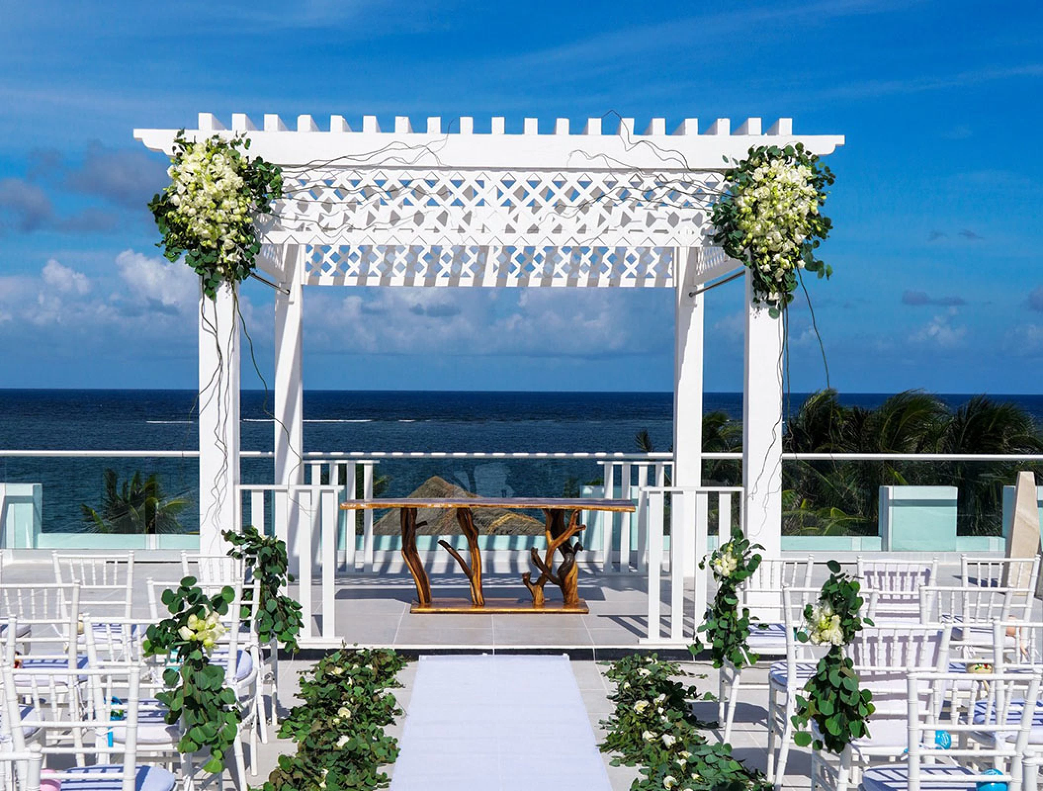 Ceremony decor in Sky Wedding at Margaritaville Island Reserve Riviera Cancun.