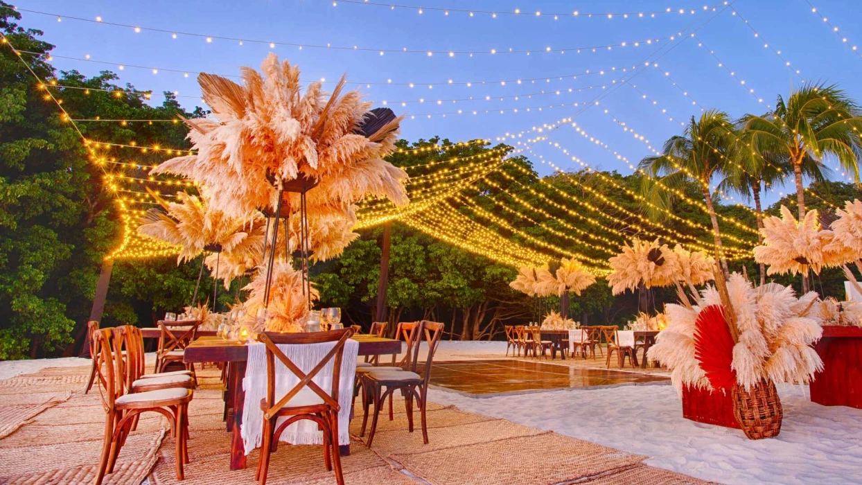 dinner reception on the beach at Marival Armony Luxury Resort & Suites