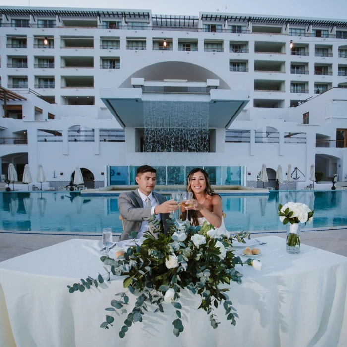 Couple on the pool terrace at Marquis los cabos