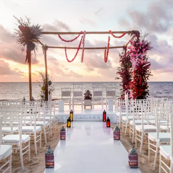 Ceremony decor in beach wedding venue at Moon Palace Resort