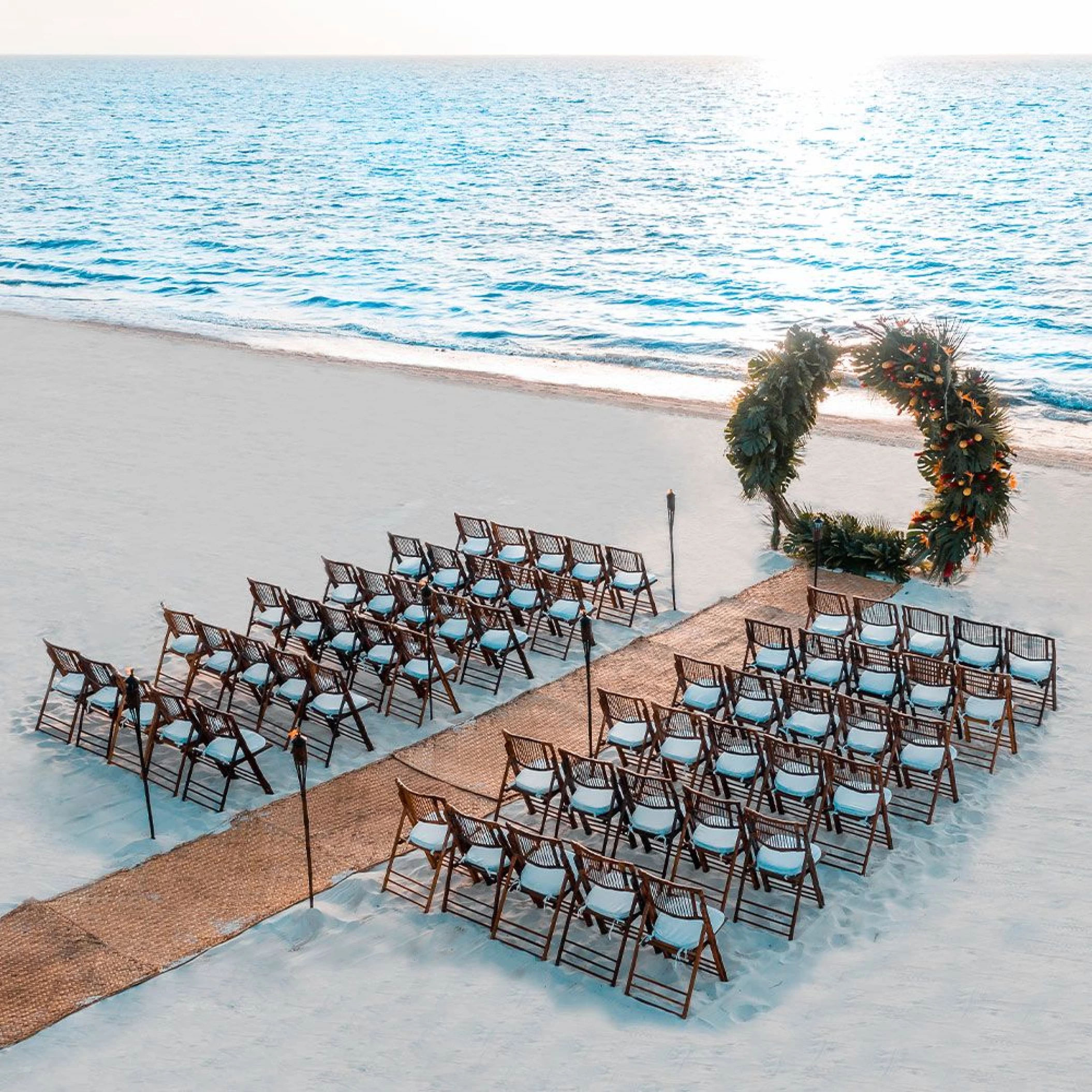 Ceremony decor in beach wedding venue at Moon Palace Resort