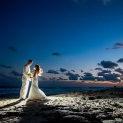 Couple at Beach Stage wedding venue at Hilton Tulum.