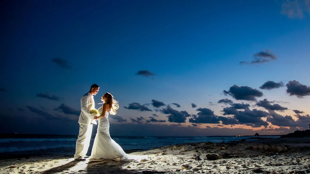 Couple at Beach Stage wedding venue at Hilton Tulum.