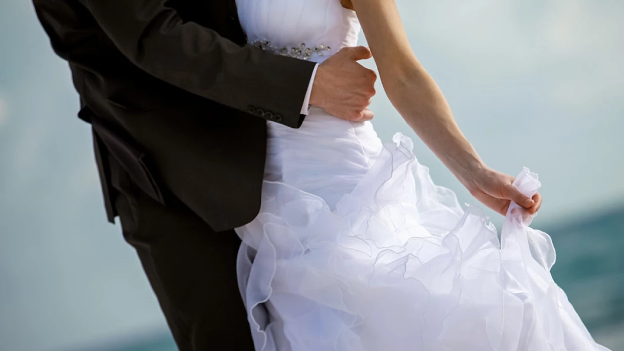 Groom And Bride Hugging.