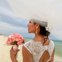 Bride on the beach at Hilton Tulum.