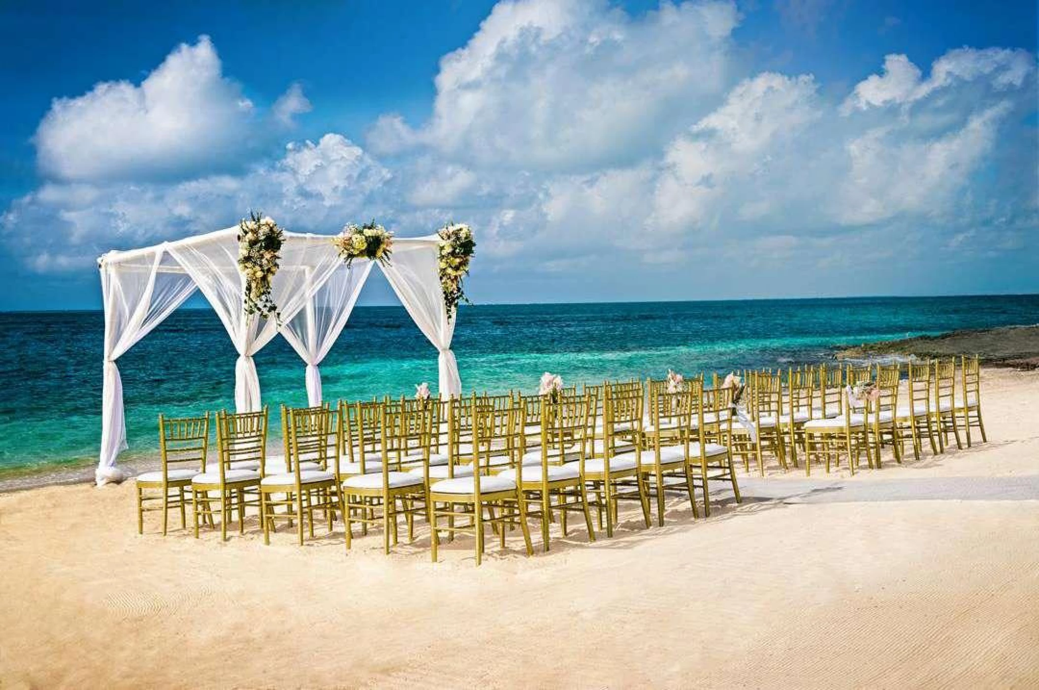 Ceremony decor on Reef beach at Nizuc Resort and Spa