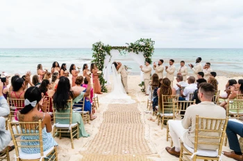 Ceremony couple on the beach wedding venue at Now Emerald cancun