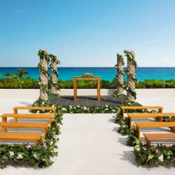 Ceremony decor on Prosperity Columns Albatross Terrace at Now Emerald Cancun