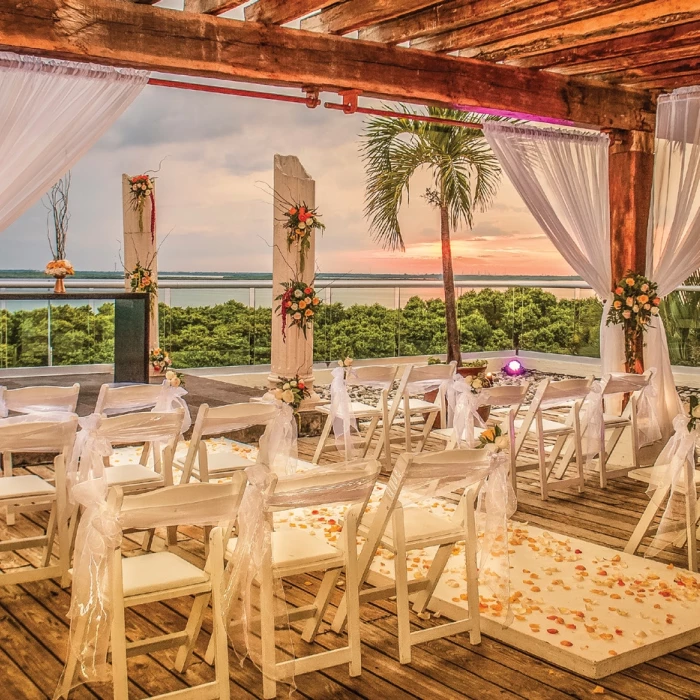 Ceremony decor on sunset terrace at Now Emerald Cancun