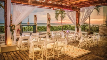 Ceremony decor on sunset terrace at Now Emerald Cancun