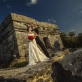 Occidental at Xcaret wedding couple on Mayan ruin