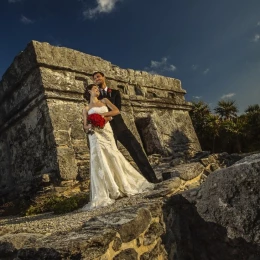 Occidental at Xcaret wedding couple on Mayan ruin