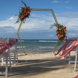 Beach wedding setup at Ocean Coral & Turquesa resort.