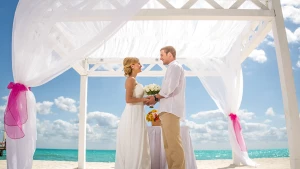 Couple celebrating their ceremony on the beach