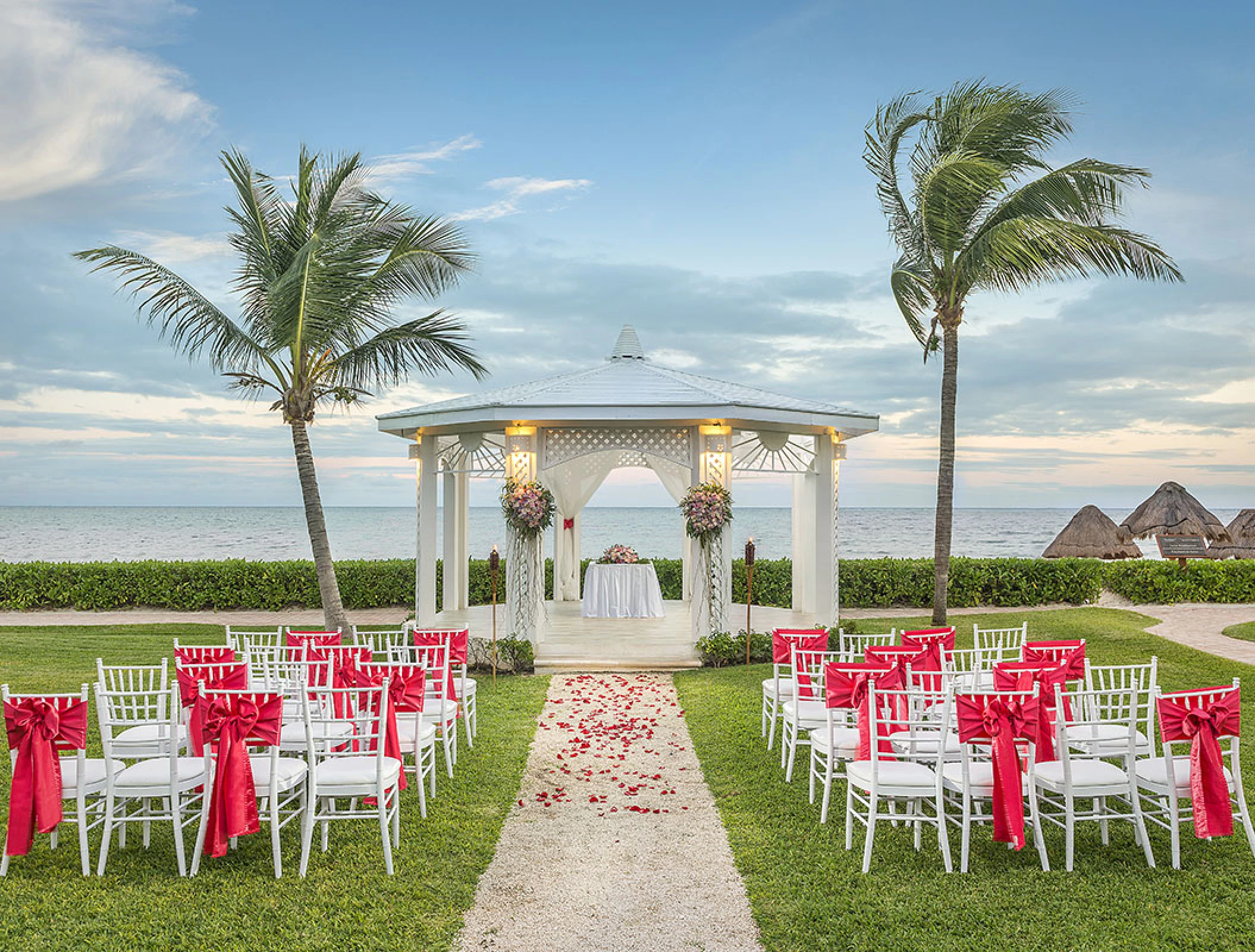 Wedding ceremony setup on garden gazebo at Ocean Coral & Turquesa Resort.