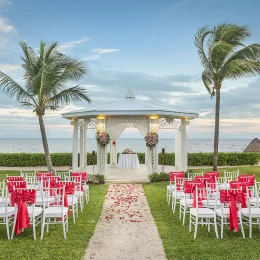 Wedding ceremony setup on garden gazebo at Ocean Coral & Turquesa Resort.