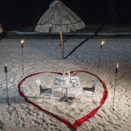 Romantic dinner setup at the beach of Ocean Coral & Turquesa