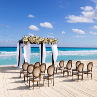 Ceremony decor on the beach wedding venue at Paradisus Cancun