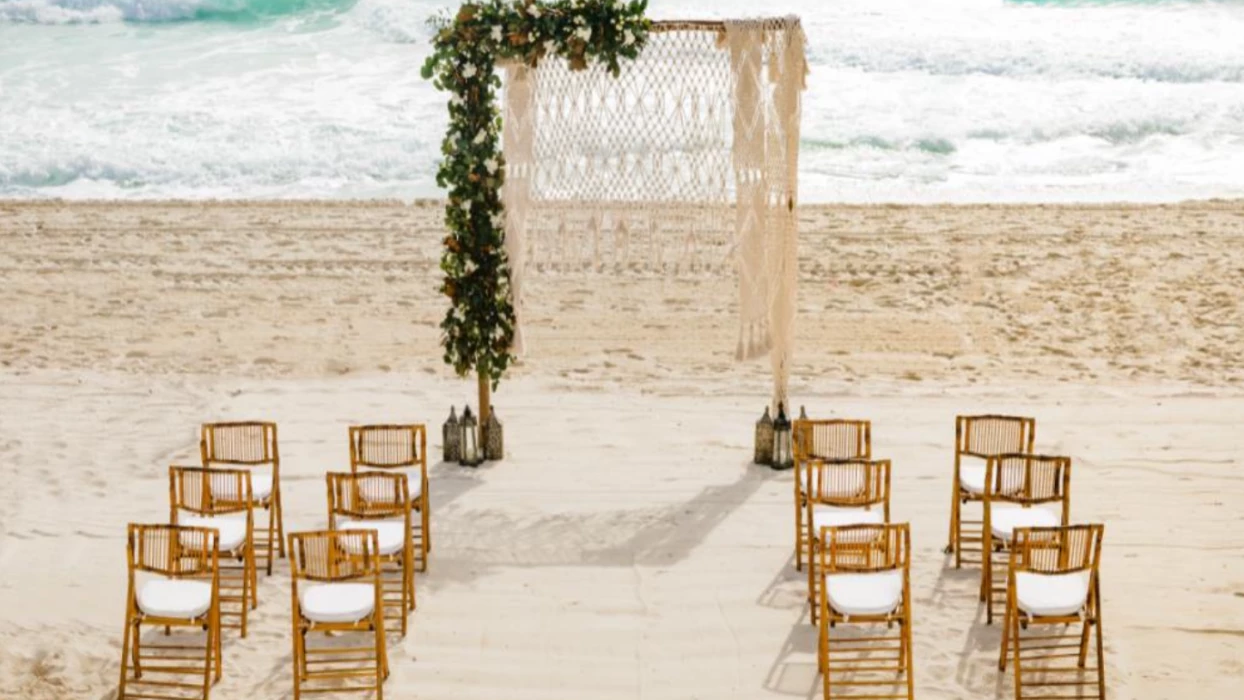 Ceremony decor on the beach wedding venue at Paradisus Cancun