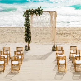 Ceremony decor on the beach wedding venue at Paradisus Cancun