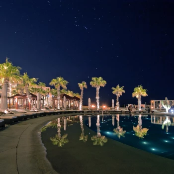 Night views on the main pool at Pueblo Bonito Pacifica Golf & Spa Resort