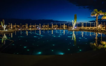 Main pool overnight at Pueblo Bonito Pacifica Golf & Spa Resort