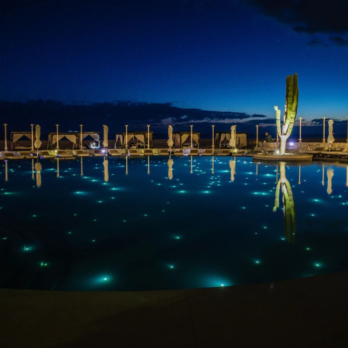 Main pool overnight at Pueblo Bonito Pacifica Golf & Spa Resort