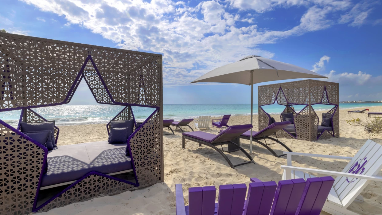 Planet Hollywood Cancun beach wth daybeds and lounge chairs