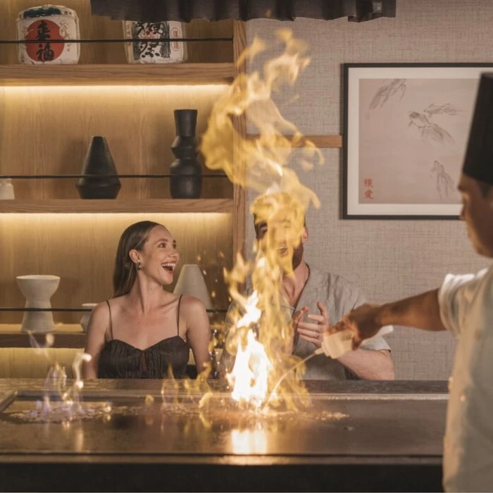 couple at a teppanyaki restaurant at AVA Resort Cancun