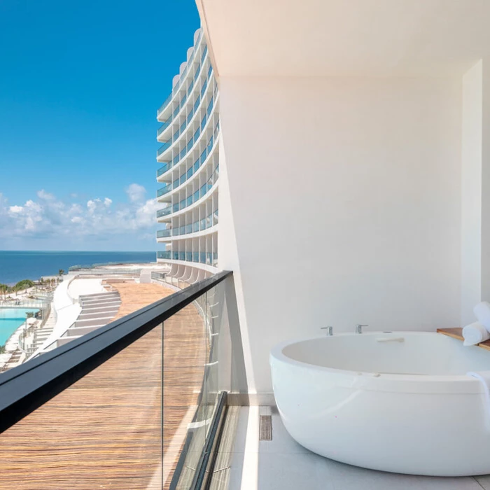 hot tub in suite balcony at AVA Resort Cancun