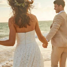 bride and groom on the beach at Bahia Principe