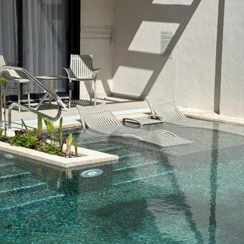 Swim up pool room balcony at Bahia Principe Resorts.