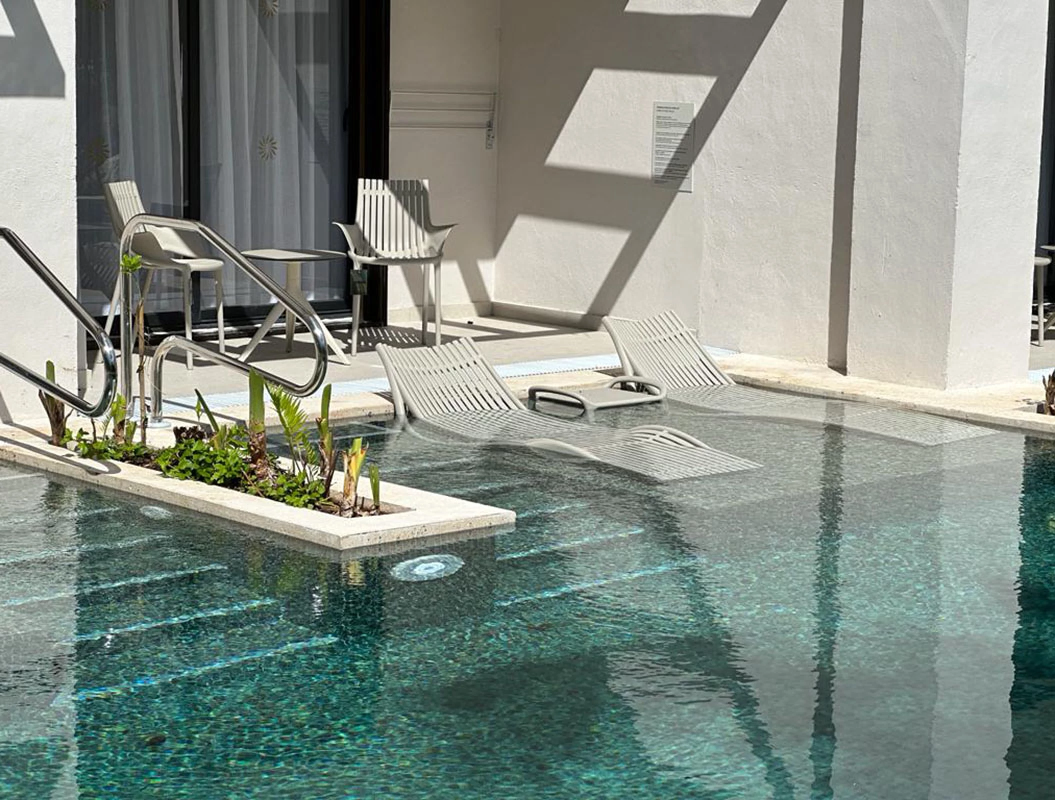 Swim up pool room balcony at Bahia Principe Resorts.