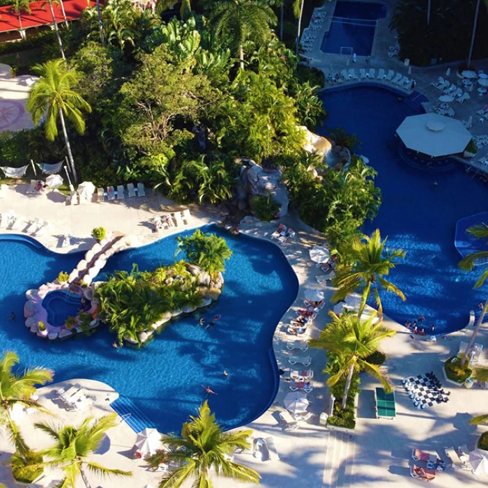 Barcelo Puerto Vallarta resort gardens and pool drone shot