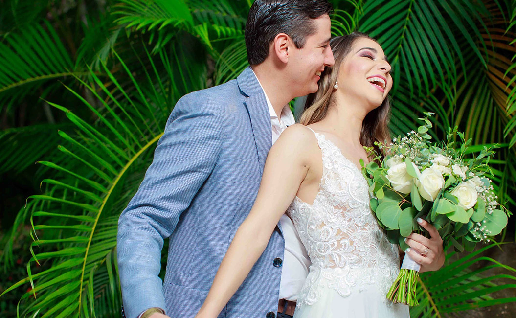 Couple posing at La Plazita wedding venue in Barcelo Puerto Vallarta